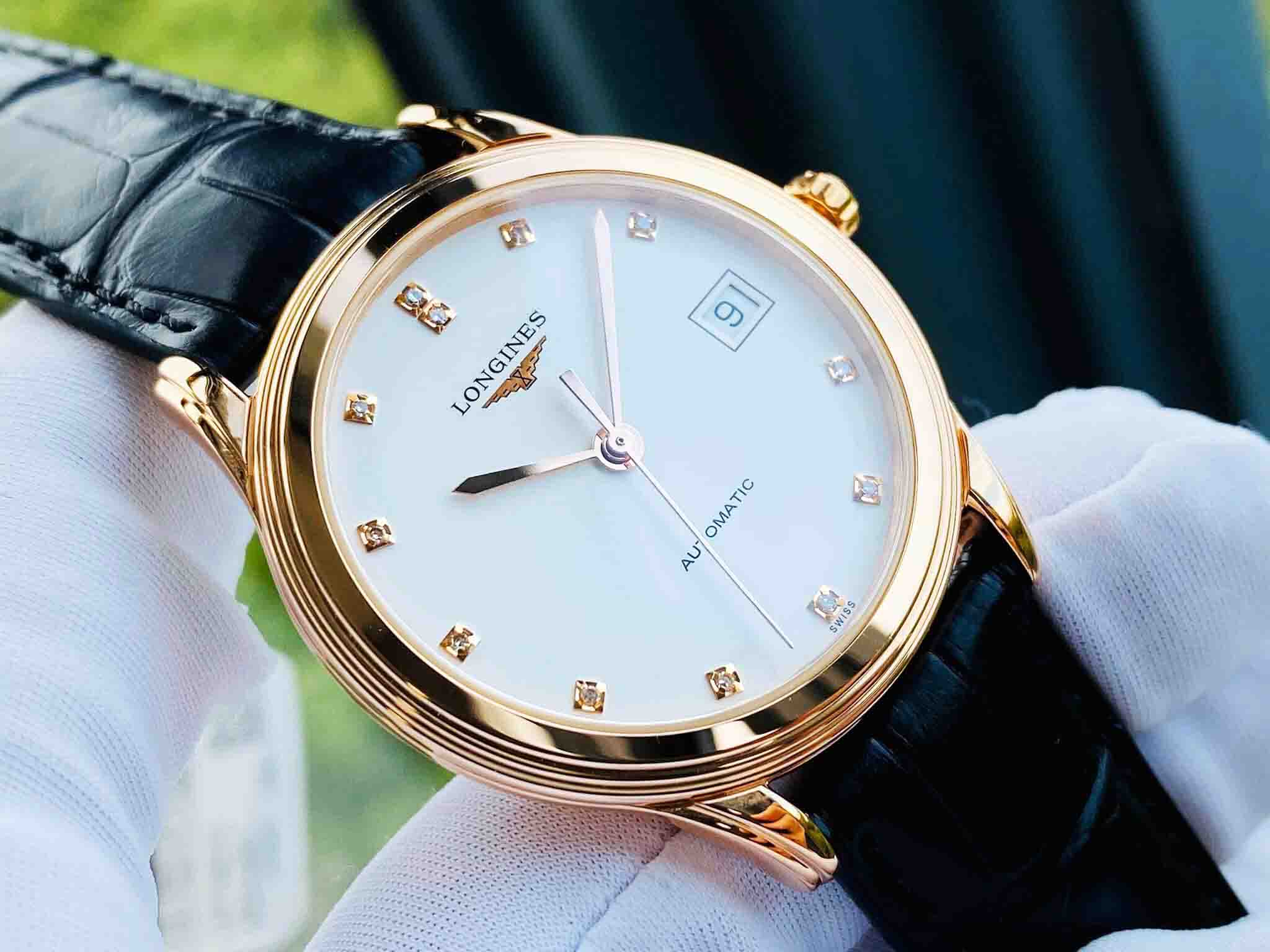 Longines Longines Flagship L4.774.8.27.2 механические мужские часы часы крупный план белый циферблата