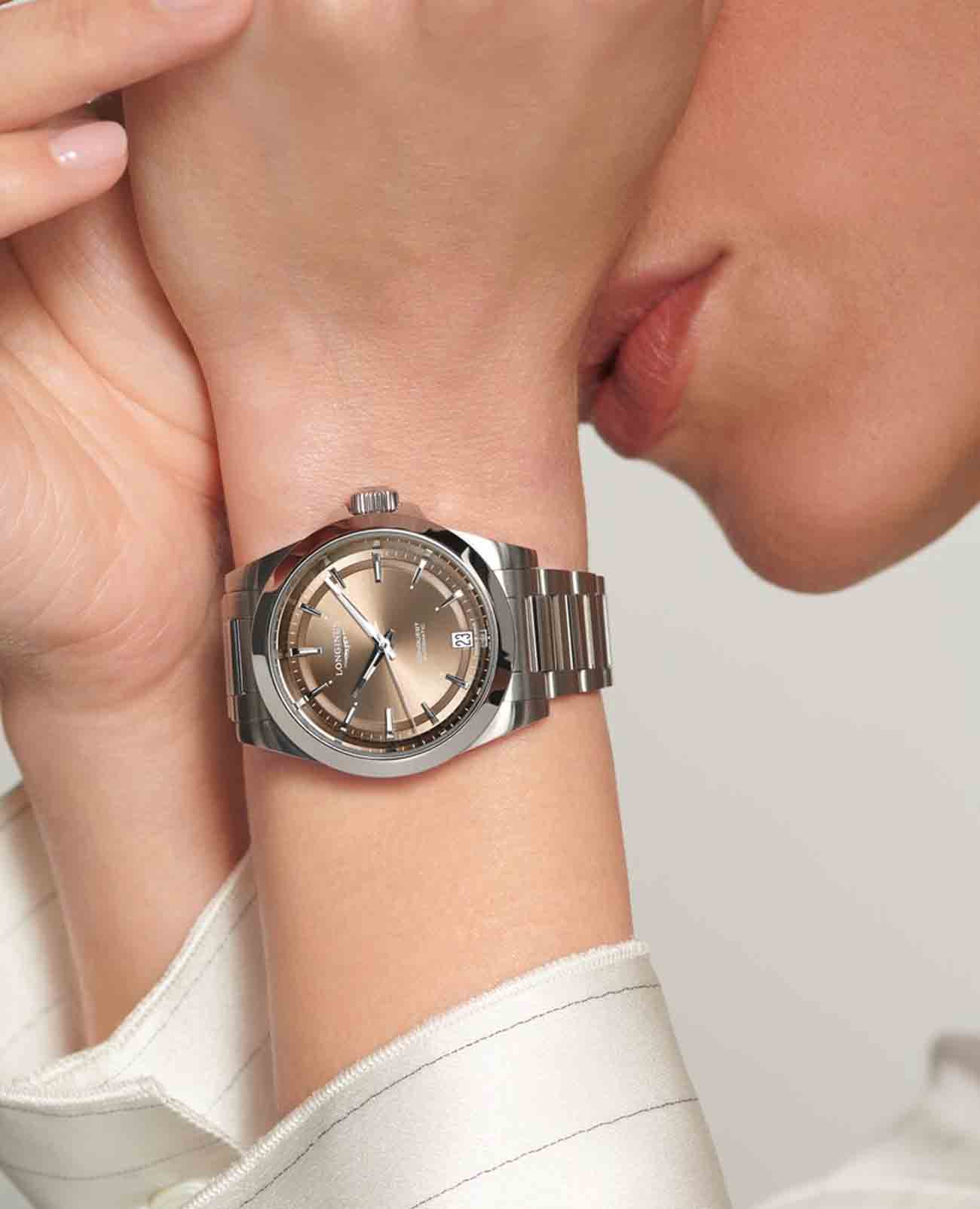 Longines Longines Conquest L3.430.4.62.6 женские часы бежевый циферблат на запястье