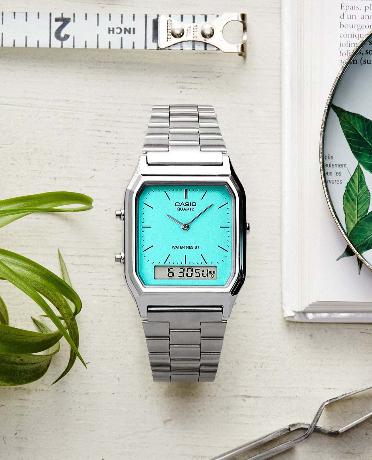 Casio Casio Collection AQ-230A-2A2, vintage япония мужские часы на браслете нержавеющая сталь боковой вид