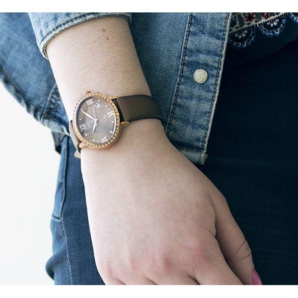 Orient Orient UNEK001T (FUNEK001T)  женские часы часы крупный план коричневый циферблата