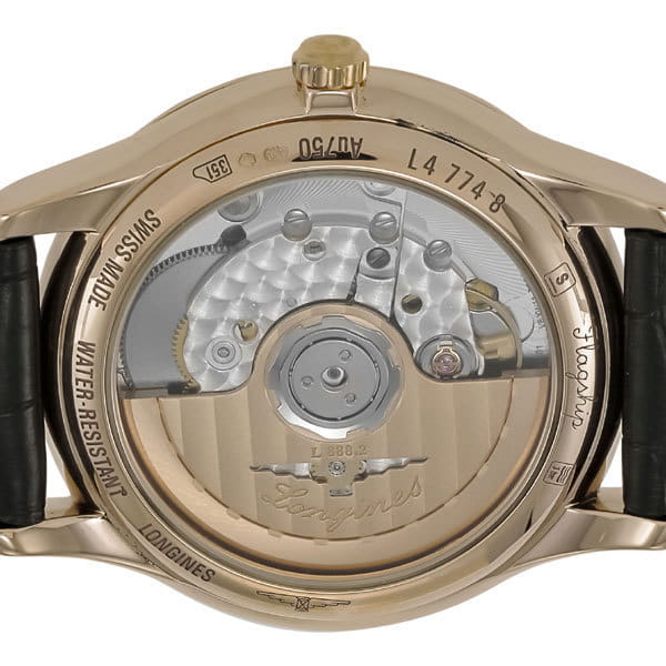 Longines Longines Flagship L4.774.8.21.2 механические мужские часы часы крупный план белый циферблата